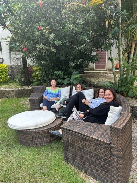 Guests relaxing on garden seating